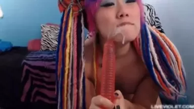 Pierced tatted asian whore deepthroats huge dildo and fucks her pussy